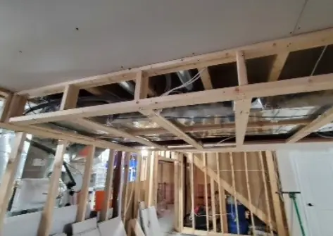 Basement ceiling and walls framed before drywall